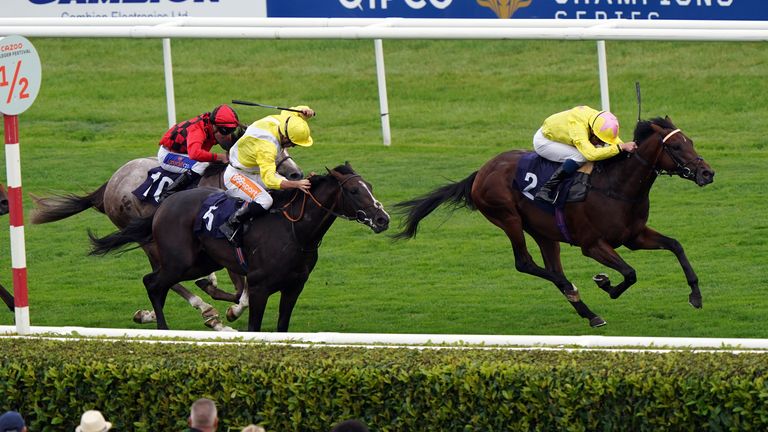 X J Rascal (right) wins at Doncaster&#39;s St Leger Festival under William Buick