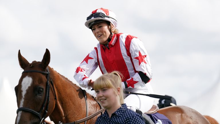 Sammy Jo Bell is led back in after victory in the Leger Legends race