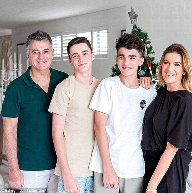 Kylie (right) pictured with her husband Tony Gillies and their sons Gus (left) and Archie (right)