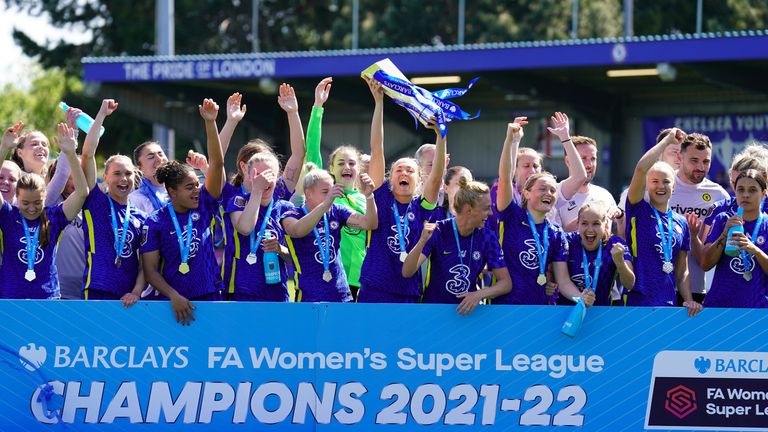 Chelsea&#39;s Magdalena Eriksson lifts the Barclays FA Women&#39;s Super League trophy after her side won the competition after the Barclays FA Women&#39;s Super League match at Kingsmeadow