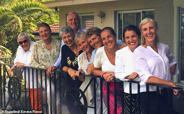 Emma Rossi, who is second from the right, with other members of her family at the home in Northwood, which has been destroyed by fire