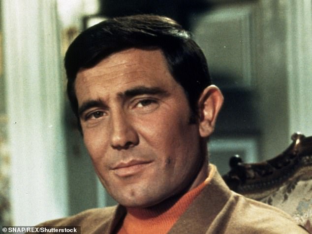 'He spent all of the interview just talking basically about his sexual conquests, he was he swore, he certainly wasn't talking about his Bond movies, he downplayed the Queen, a day after she died,' the caller said. Pictured is Lazenby in a still from On Her Majesty's Secret Service, 1969