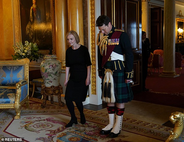 Major Thompson (right) was pictured on Friday with Prime Minister Elizabeth Truss (left)