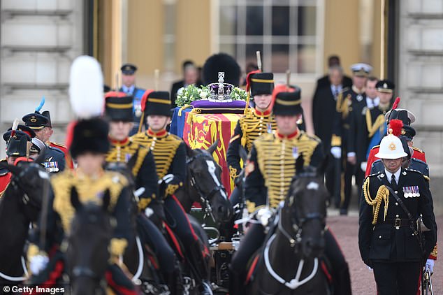 2.22pm: The gun carriage bearing the coffin of the late Queen Elizabeth II departs Buckingham Palace, transferring the coffin to The Palace of Westminster