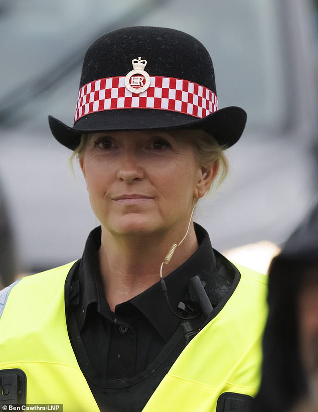 Duty: Rod was not joined by his wife Penny Lancaster who was busy with her police work as she helped locals in Norcolt in front of the Queen's coffin as Her Majesty was driven to Buckingham Palace on Tuesday