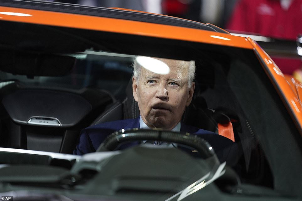 President Joe Biden - a self-confessed 'car guy' - toured the Detroit Auto Show Wednesday and announce that $900 million in Bipartisan Infrastructure Law funding will go toward building electric vehicle chargers across 53,000 miles of highway