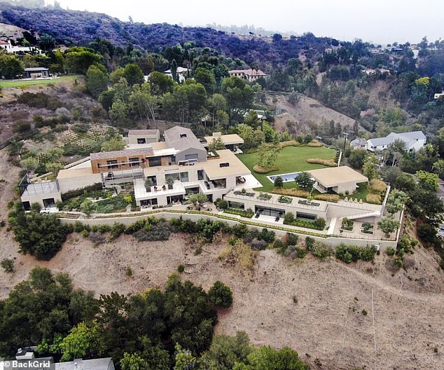 Wow: He will keep their former Brentwood home in the settlement, with the mansion valued at $65 million