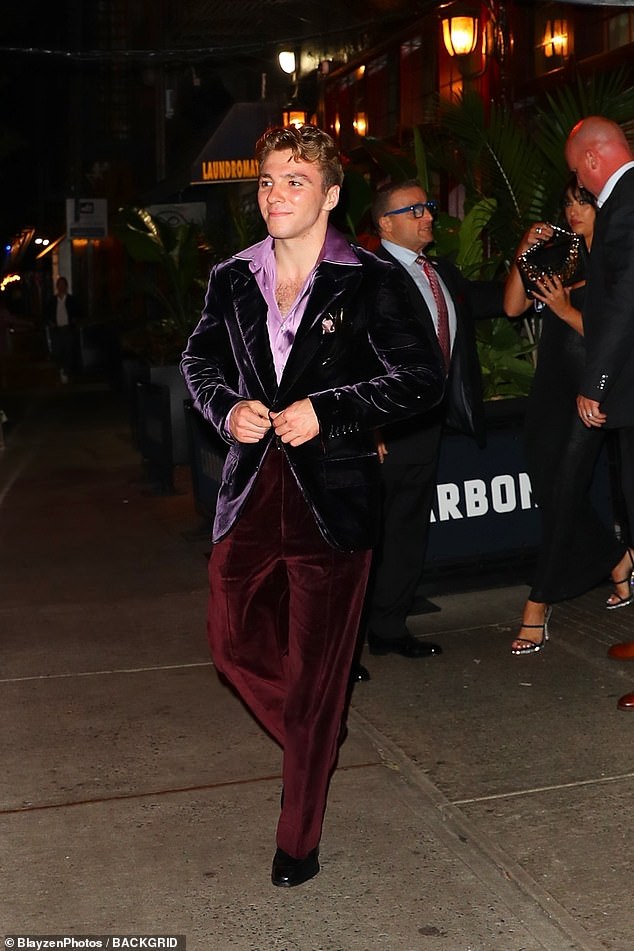 Stylish: The son of the Material Girl and director Guy Ritchie donned a velvet ensemble