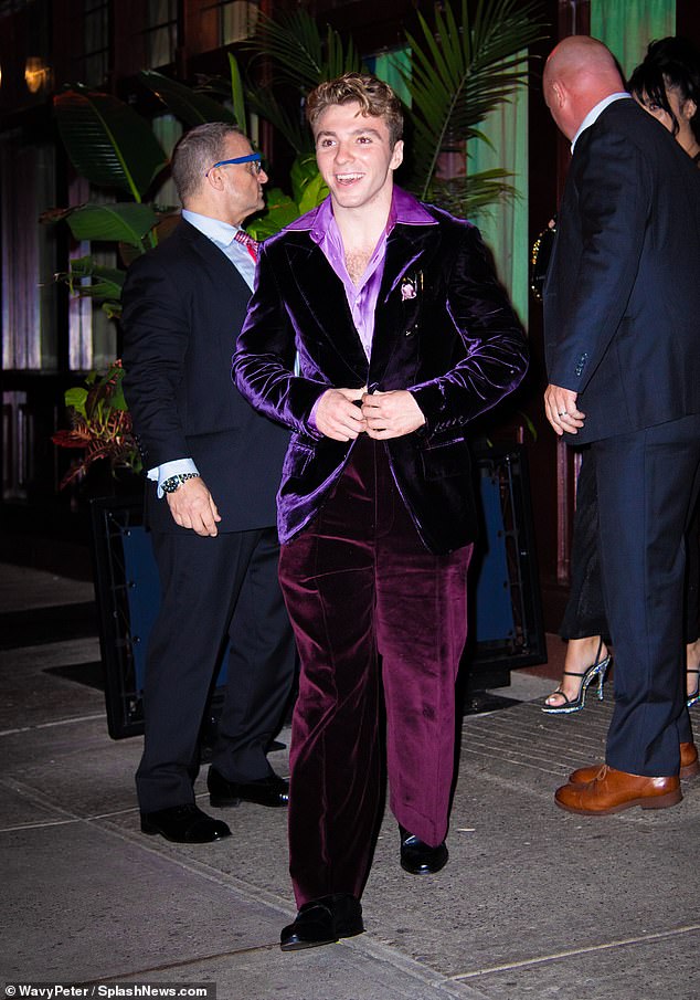 Dapper: Madonna's son Rocco Ritchie smiled as he made his way out of the restaurant