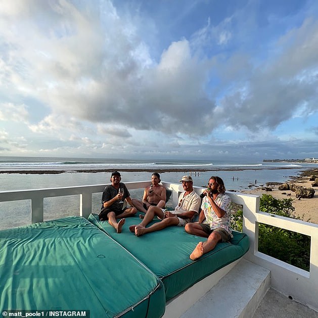 He also spent time with his mates Adam Bennetts (left), former Masterchef star Hayden Quinn (second from left) and pro surfer Matt Wilkinson (right)