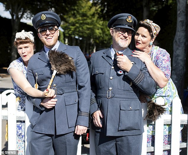 Authentic: Car enthusiasts converged on the historic race meeting, the only sporting event of its kind to be staged entirely in a period theme