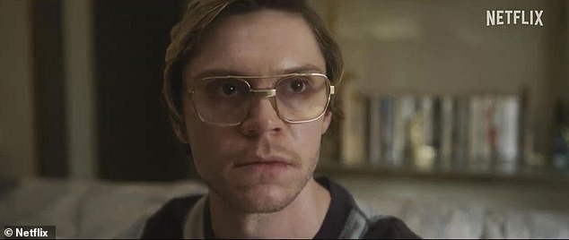 Pure evil: The trailer ends with Dahmer staring at his neighbor and ominously demanding: 'Eat it'