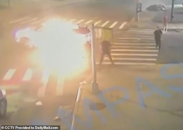 Passersby can be seen running to aid the 34-year-old driver of the moped who is expected to survive and was treated for cuts to his head