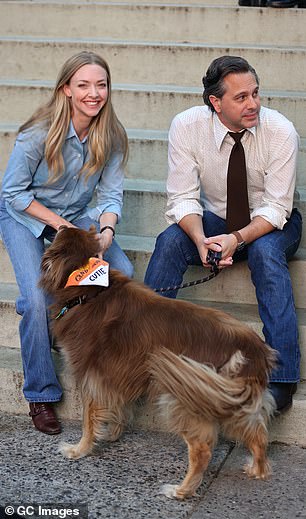 Cute: The couple was pictured resting outside with their friendly dog, Finn, as they waited to film their scenes for The Crowded Room