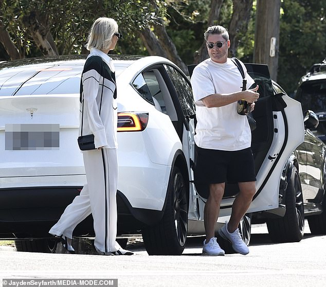 The retired cricketer dressed casually in a simple white T-shirt