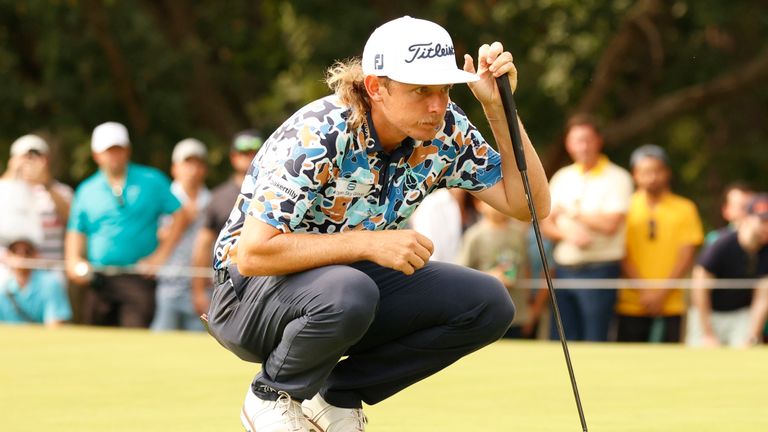 Smith lines up a putt on the 13th hole