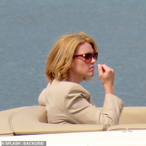 At sea: Erin put on a polished display as she rode the boat with a French flag blowing in the breeze