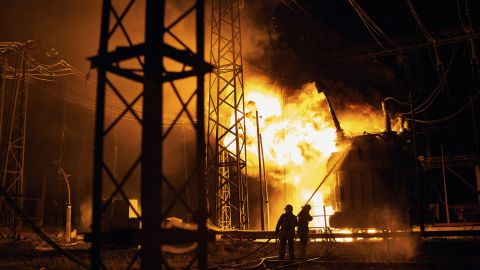 Ukrainian firefighters put out a fire after a Russian rocket attack on an electric power station in Kharkiv on Sunday, September 11, 2022.