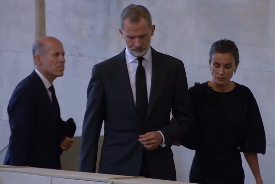 The  Spanish couple bowed their heads in respect as they made their way from Westminster Hall on Sunday evening