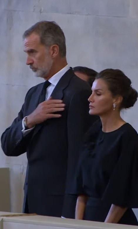 King Felipe, who referred to the Queen as his 'dear Aunt Lilibet' crossed himself as he took part in the sombre occasion