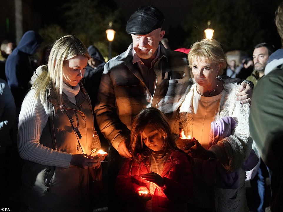 Members of the public observed the silence this evening, holding candles in Her Majesty's honour