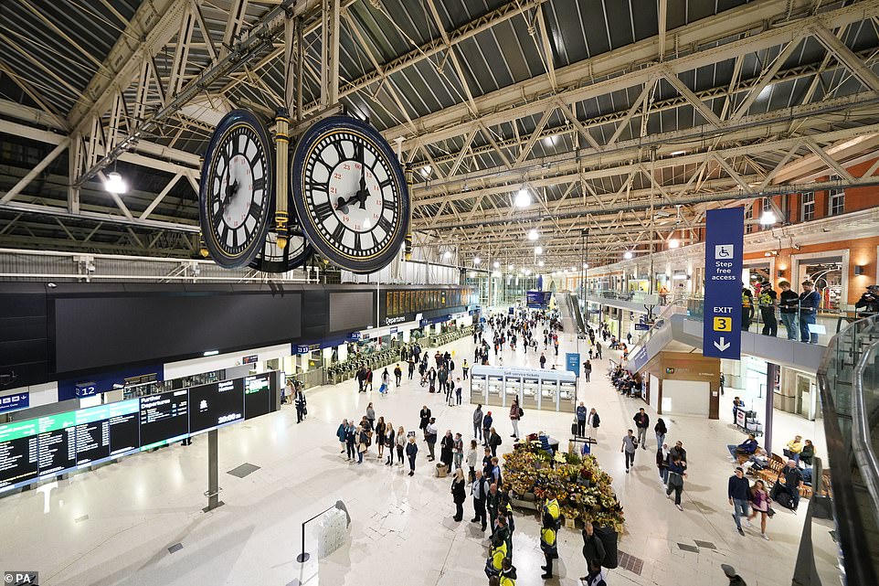 Members of the public observed the national minute's silence for the Queen at Waterloo Station in London