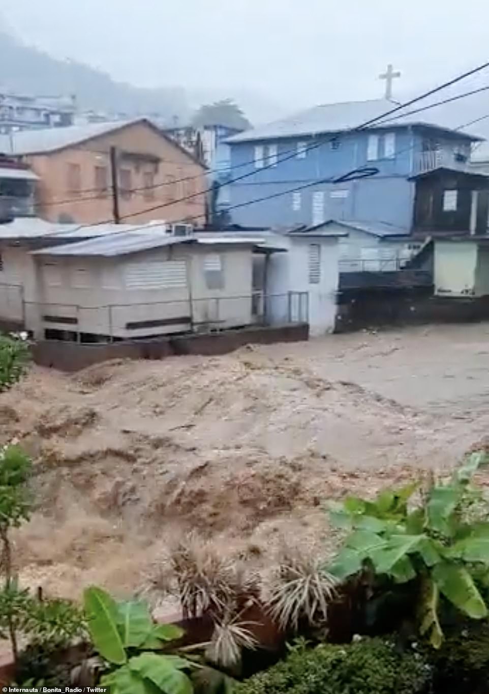 One Twitter user captured this raging torrent of water sweeping through Pueblo de Naranjito