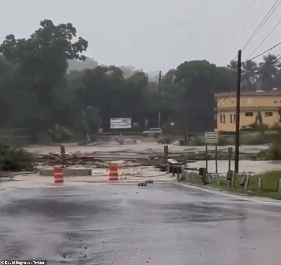 Roads were turned into rivers. There is no sign of a metal bridge that once stood at this point