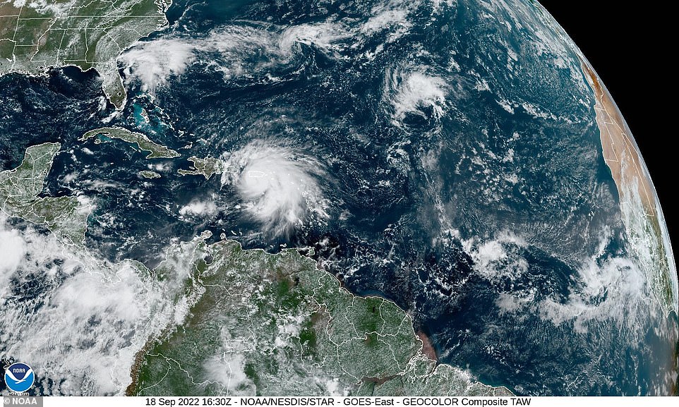 Te entire of Puerto Rico island appears engulfed by the hurricane on Sunday afternoon