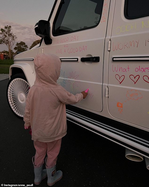 Anna has fans of all ages and a particularly young follower was snapped signing a message