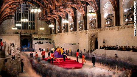 The Queen&#39;s children hold a silent vigil for their matriarch in Westminster Hall on Friday.