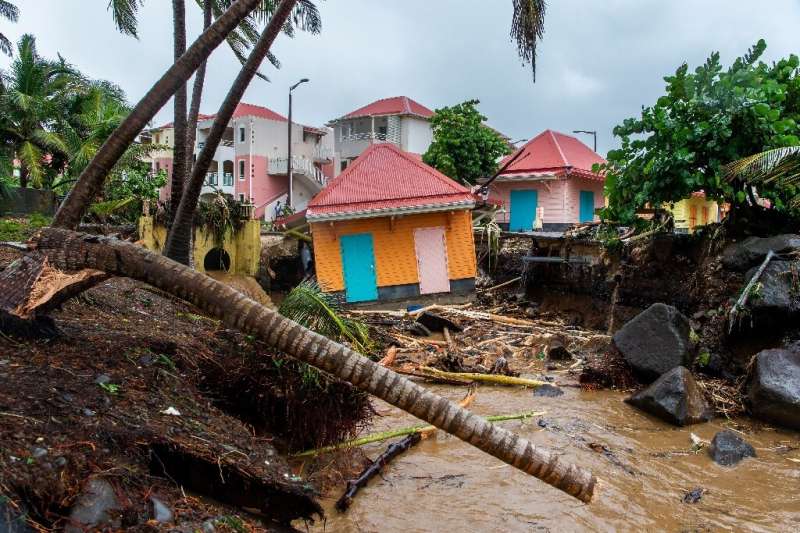 The storm has caused one fatality -- a man who was killed after his house was swept away by flooding in the French overseas depa