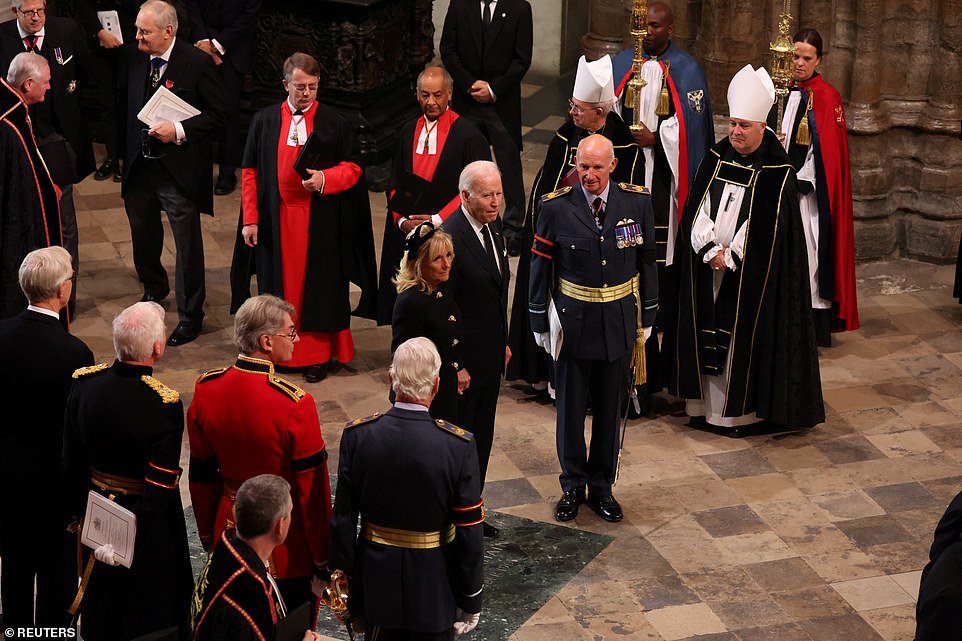 U.S. President Joe Biden and first lady Jill Biden arrive, on the day of the state funeral and burial of Britain's Queen Elizabeth