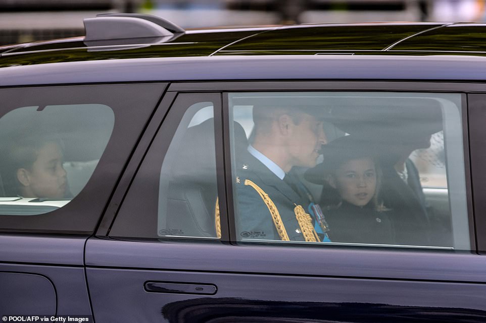 Britain's Prince William, Prince of Wales, and his children arrive at Westminster Hall. Charlotte was next to her father. George was in the back