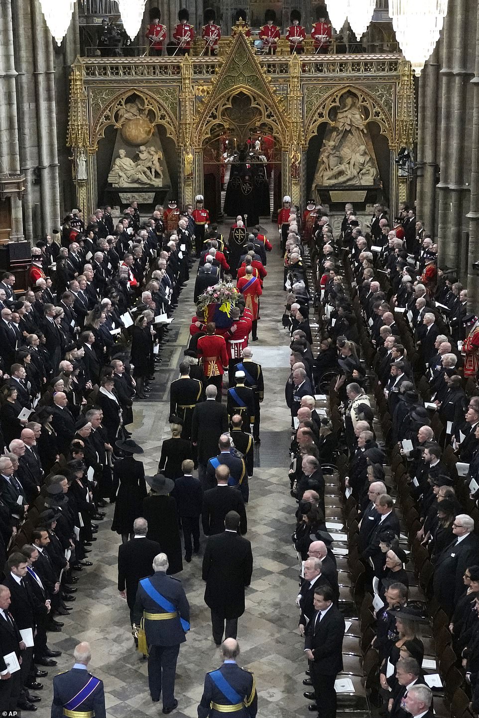 King Charles III, Camilla, the Queen Consort, Princess Anne, and her husband Vice Admiral Tim Laurence, Prince Andrew, Prince Edward, and his wife Sophie, Countess of Wessex, Prince William, and Kate, Princess of Wales with their children Princess Charlotte of Wales, Prince George of Wales, Britain's Prince Harry, and his wife Meghan, the Duchess of Sussex, David Armstrong-Jones, Earl of Snowden, Peter Phillips, The Duke of Gloucester, Prince Michael of Kent and the Duke of Kent follow the coffin