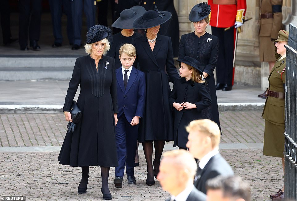 Queen Consort Camilla led Prince George, Princess Charlotte, Kate Middleton, Meghan Markle and Sophie Wessex out of the gates of Westminster Abbey. Sophie (right) appeared visibly moved