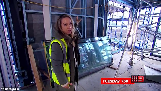 Rachel (pictured) and Ryan install a 'wall to ceiling stone fireplace' to House 2's living space