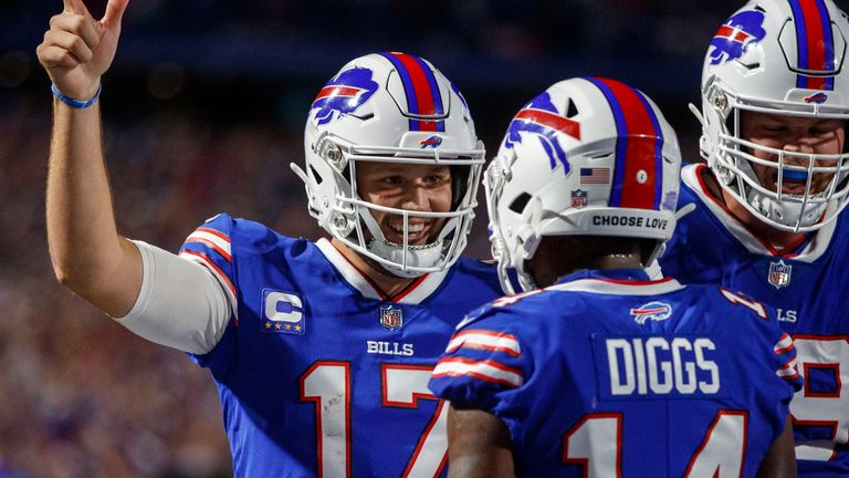 Buffalo Bills quarterback Josh Allen celebrates with wide receiver Stefon Diggs after one of their three touchdown connections