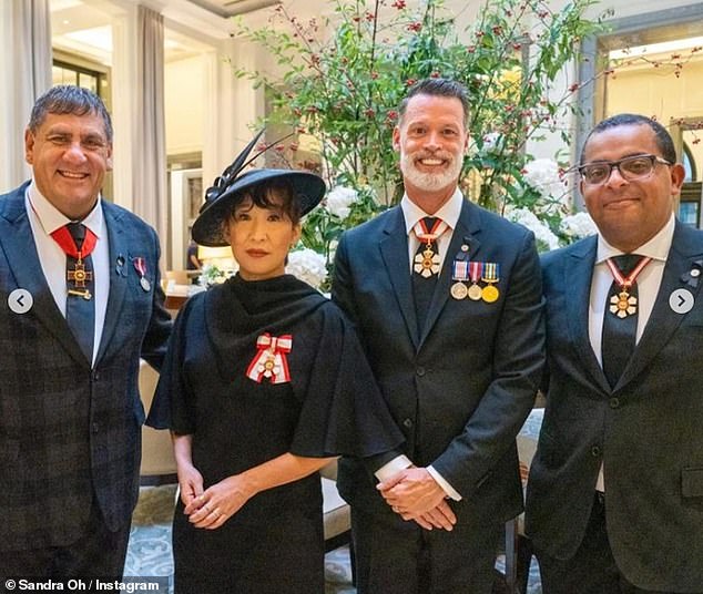 Prestigious: The Golden Globe winner was then joined by three male companions who all donned black suits for the funeral (pictured Gregory Charles, Mark Tewksbury and Les Palmer)