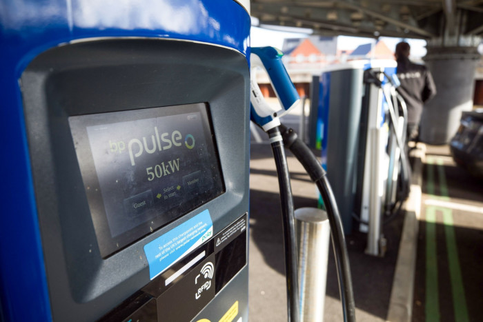 BP Plc Pulse company logo on a screen on an electric vehicle charging point