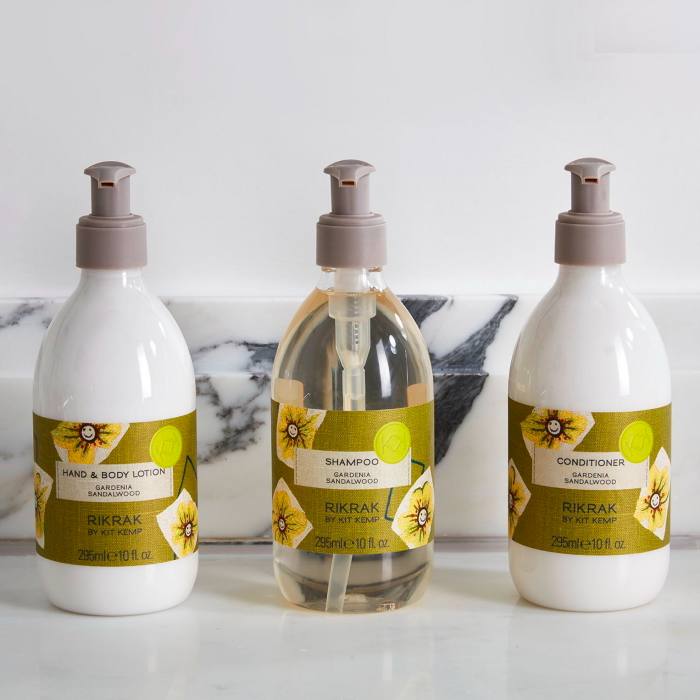 Three bottles of products in the Ham Yard Hotel’s RikRak range of toiletries