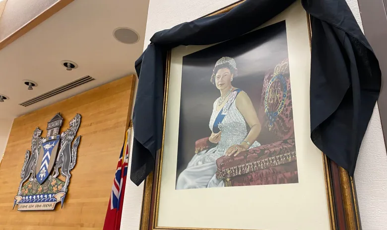 A portrait of the queen hangs in the Sault Ste. Marie city council chambers, draped with a black cloth. 