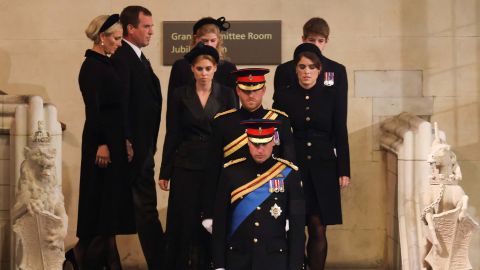 William, Prince of Wales leads his brother Prince Harry, Duke of Sussex, followed by their cousins before mounting a vigil around the coffin of their grandmother Queen Elizabeth II on September 17, 2022.