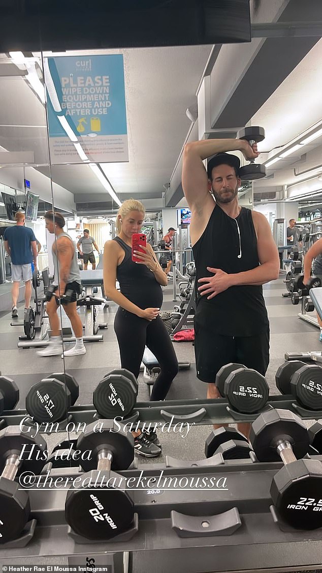 Heather Rae Young cradles her growing baby bump bump as she hits the gym with Tarek El Moussa 