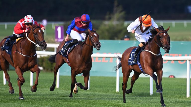 Pearls Galore (orange cap) comes home in front in the Coolmore America Justify Matron Stakes