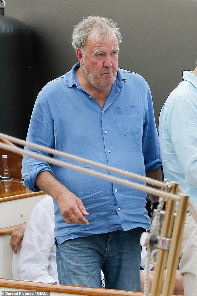 Jeremy Clarkson grabs a bite to eat with partner Lisa Hogan and Roger Taylor in St. Tropez 