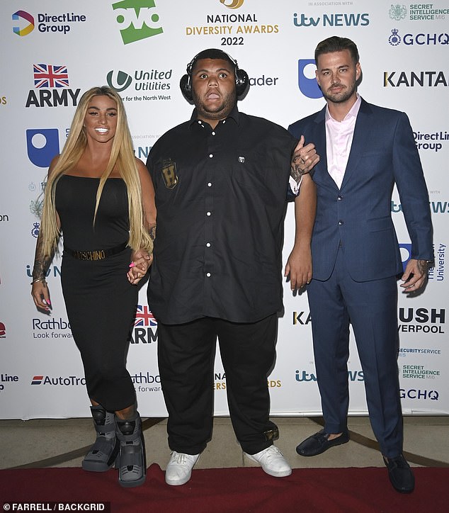 Katie Price parades her incredible figure in skintight black dress at the National Diversity Awards