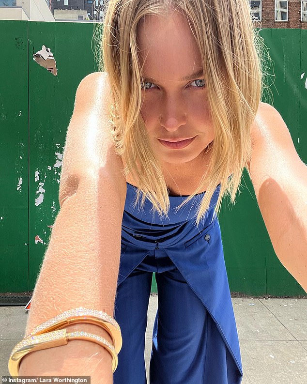 Lara Worthington shows off her slender frame as she models a $47,000 diamond bracelet