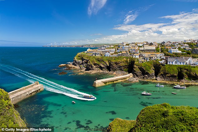 Locals living in tourist-filled Port Isaac, Cornwall, celebrate the end of ITV’s series Doc Martin