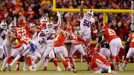 Harrison Butker kicks the game-tying field goal for the Kansas City Chiefs against the Buffalo Bills at the end of the fourth quarter to send it in to overtime in the AFC Divisional game at Arrowhead Stadium on January 23.